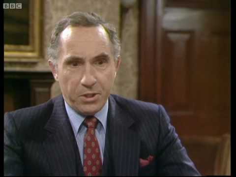 Sir Humphrey's face looks considerably more flustered than his power ensemble.